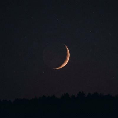 Crescent new moon in a dark sky